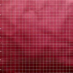 Burgundy chart paper background in a square grid pattern