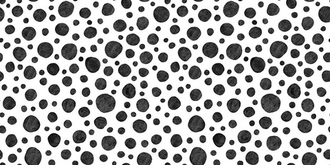 Seamless playful watercolor polkadots or animal spots pattern, high contrast black and white baby nursery print. Abstract geometric circles background texture in a trendy bold whimsical doodle style.