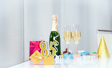 Date of birth with number  85. Festive Champagne in glasses with gift boxes, anniversary postcard....