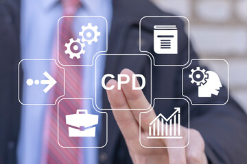 Businessman using virtual touch screen presses abbreviation: CPD. Continuing Professional...
