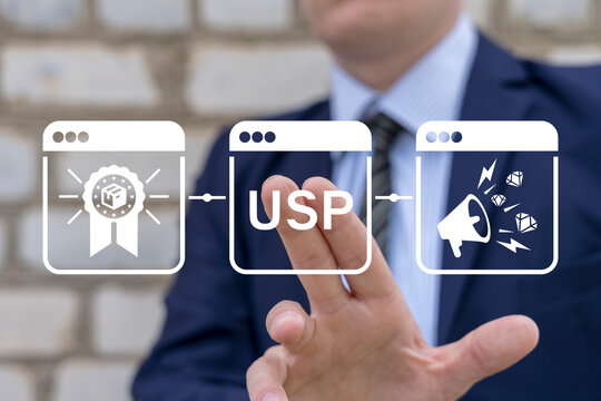 Businessman using virtual touch interface presses abbreviation: USP. Unique Selling Point ( USP ) business concept.