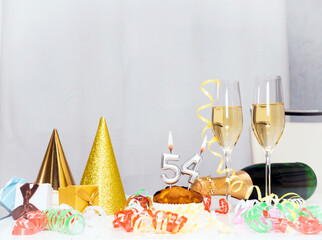Date of Birth  54. Festive background with a bottle of champagne. Festive Champagne in glasses with...