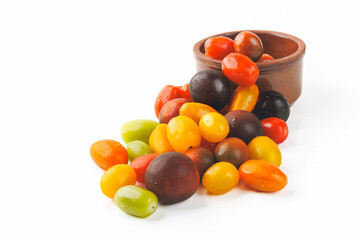 colorful cherry tomatoes isolated on a white background. studio photo.