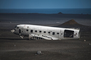 Fototapeta na wymiar Airlane wreck from left side. In Iceland at summer