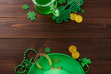 Green galore: Vibrant St. Patrick's Day festivities. Top view shot of green beer, party eyewear,...