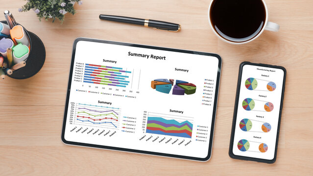 Wooden desk workplace with blank screen tablet and smartphone, pen and cup of coffee, Top view flat lay.