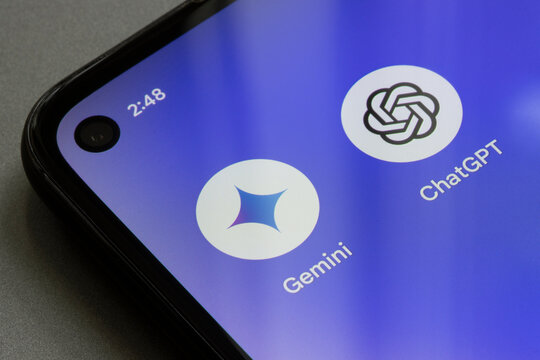 Portland, OR, USA - Feb 8, 2024: Gemini and ChatGPT app icons are seen on a Google Pixel smartphone. AI competition and Google's Gemini vs OpenAI's ChatGPT concepts.