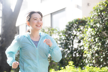 Spring, summer and fresh greenery for young women running and walking.