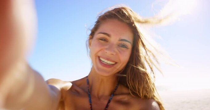 Woman, smile and wave on video call at beach, travel influencer and greeting while live streaming. Female person, hello and confident on vlog, internet connection and portrait on vacation or holiday