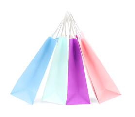 Colorful paper shopping bags isolated on white