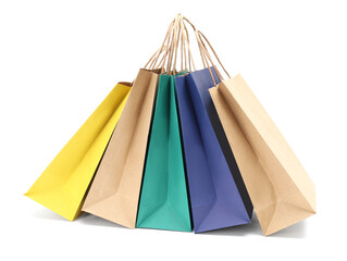 Colorful and kraft paper shopping bags isolated on white