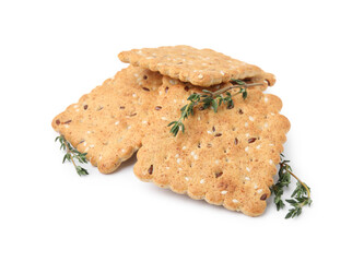 Cereal crackers with flax, sesame seeds and thyme isolated on white