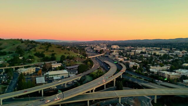 Police Cars On Interstate 680 At Golden Hour Sunset In Walnut Creek, Contra Costa, California. aerial shot