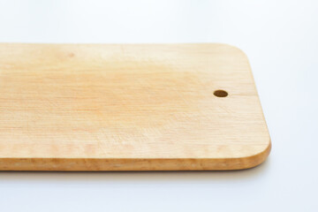 wooden cutting board isolated on white background, plank wood in the kitchen