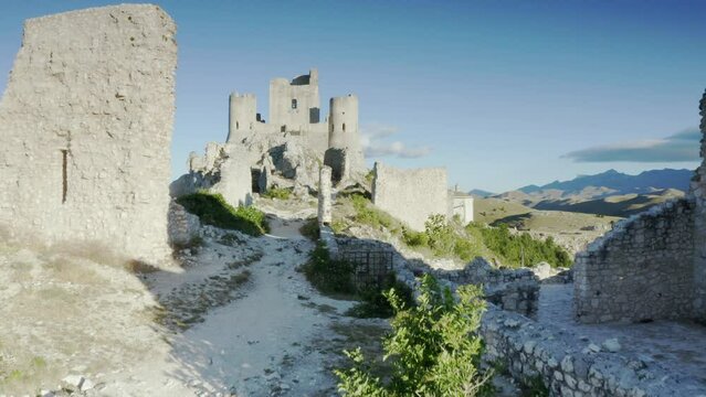 drone flying toward rocca calascio at morning abruzzo italy