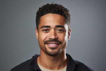 Portrait of a handsome african american man on grey background