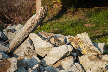 Slate stone. Pile of river rocks that have been split and will be used as building foundation...