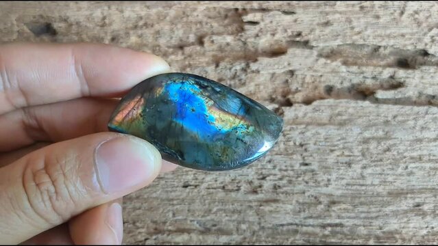 Labradorite fancy shaped polished semi-precious gemstone  beautiful rainbow color fornt and back.