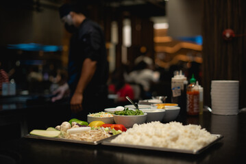 Teppanyaki is a post-World War II style of Japanese cuisine that uses an iron griddle to cook food. 