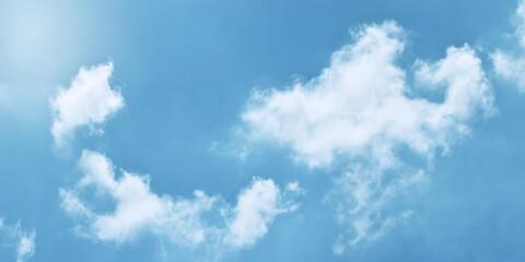 Obraz premium Light blue sky and white clouds. With copy space. 