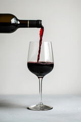 Pour red wine on white background. Generative ai