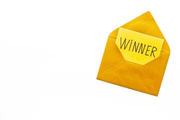 Lottery winner ticket or congratulatory letter on golden letter envelope. Winner concept.