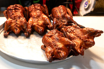 Roast duck is sold at the local market, important items used in worship according to Chinese tradition, Chinese New Year Festival
