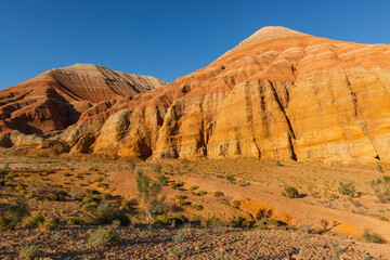 Picturesque colored clay mountains in Kazakhstan's Altyn Emel nature reserve on a summer evening