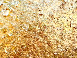 Texture of the gold leaf, Gold background, Picture from Buddha image Back