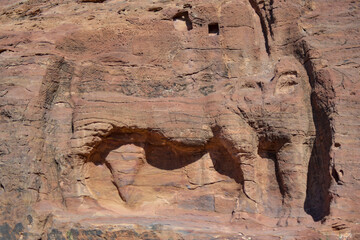 Lion carved into a rock in the city of Petra, Wadi Musa, Jordan.
