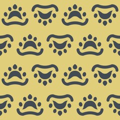 Seamless gray paw print pattern on yellow background.