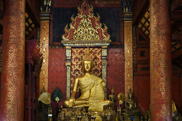 Buddhist Temple with Buddha Statue and Ornate Architecture