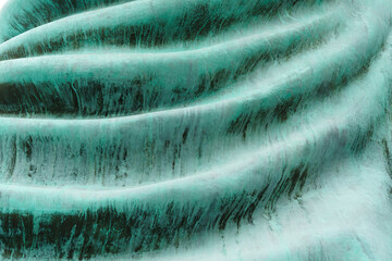 Fresh green background create a vibrant texture against a cool blue backdrop, capturing the beauty of nature in winter