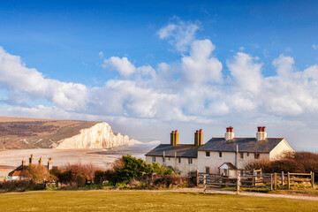 Seven Sisters, Sussex, England, UK, and the famous coastguard cottages. - obrazy, fototapety, plakaty