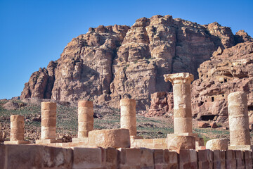 Ruins of a temple over a mountainous landscape in the city of Petra, Wadi Musa, Jordan.