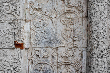  Fragment of finishing tiles on an ancient building, detail of thai temple door.