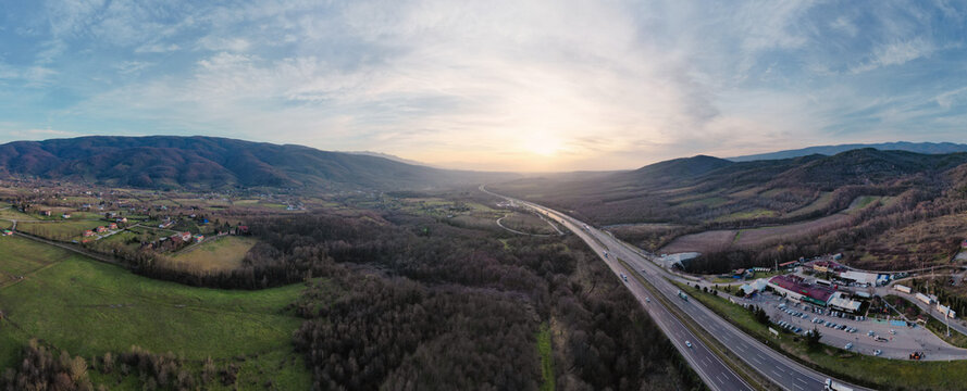 highway panoramic aerial view during sunset with amazing nature