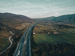 highway aerial view during sunset with amazing nature