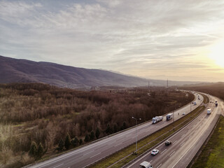 highway aerial view during sunset with amazing nature