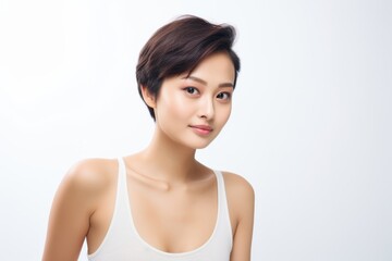 Sweet little girl donning comfy vest lingerie, posing with confidence on a clean white surface. Generative AI.