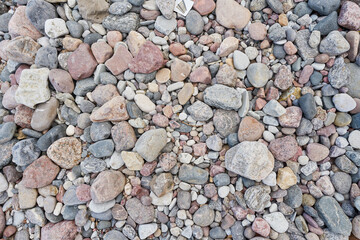 Colorful pebbles background. Stone top view texture.  - 731505494