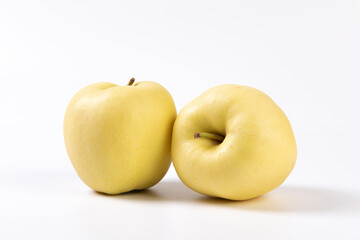 fresh yellow apples isolated on white background.