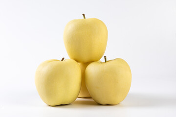 fresh yellow apples isolated on white background.
