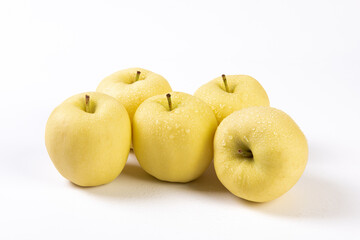fresh yellow apples isolated on white background.