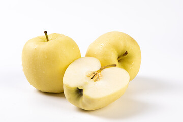 fresh yellow apples isolated on white background.