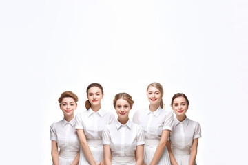Obraz premium Group of maid wearing uniform, isolated white background. Generative AI.