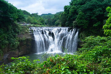 Front view of beautiful shifen waterfall in New Taipei City, Taiwan.
