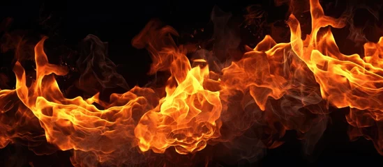 Keuken spatwand met foto Fire flames isolated on black background. © andri