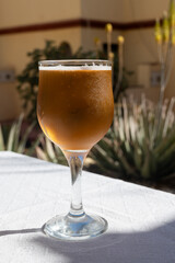 Lunch with cold beer in Spanish outdoor cafe