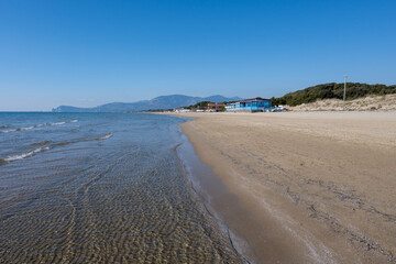 Sandy beach near medieval small touristic coastal town Sperlonga and sea shore, Latina, Italy